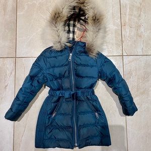Girl’s Burberry puffer jacket in emerald green